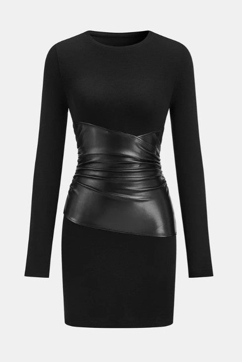 Black dress with leather panel on a white background