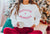 Mistletoe + Mimosas Crewneck Sweater