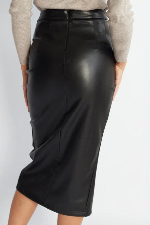 Black leather skirt worn by a person on a white background