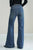 Blue jeans worn by a person on a white background