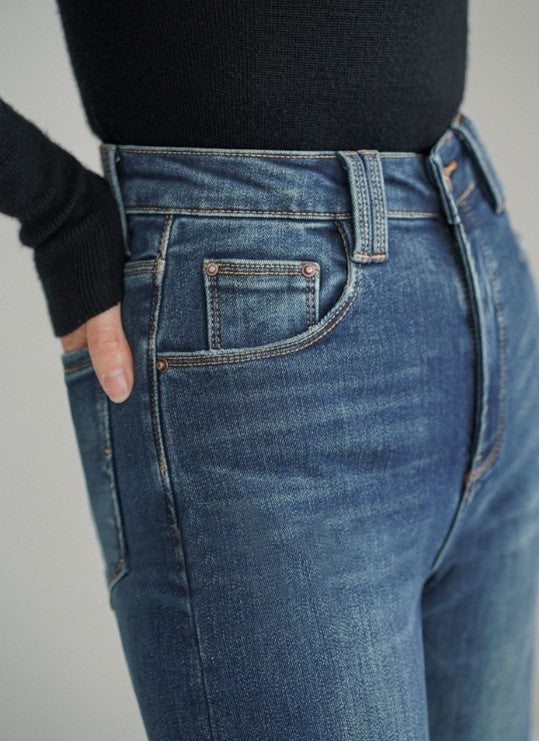 Close-up of blue jeans with a blurred background