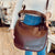 COACH Wine Leather Handbag